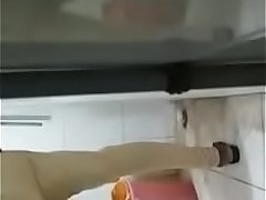 Indian girl pissing in office bathroom