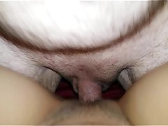 sliding a thick shaft into a tiny wet pussy